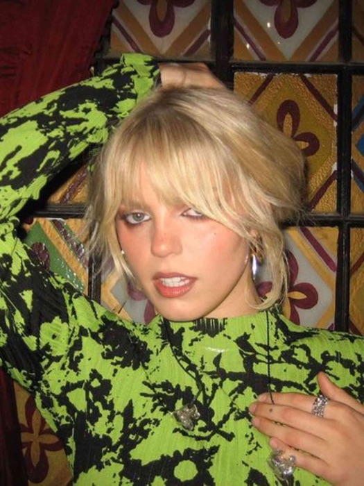 Renée Rapp wearing Sage Sorbet