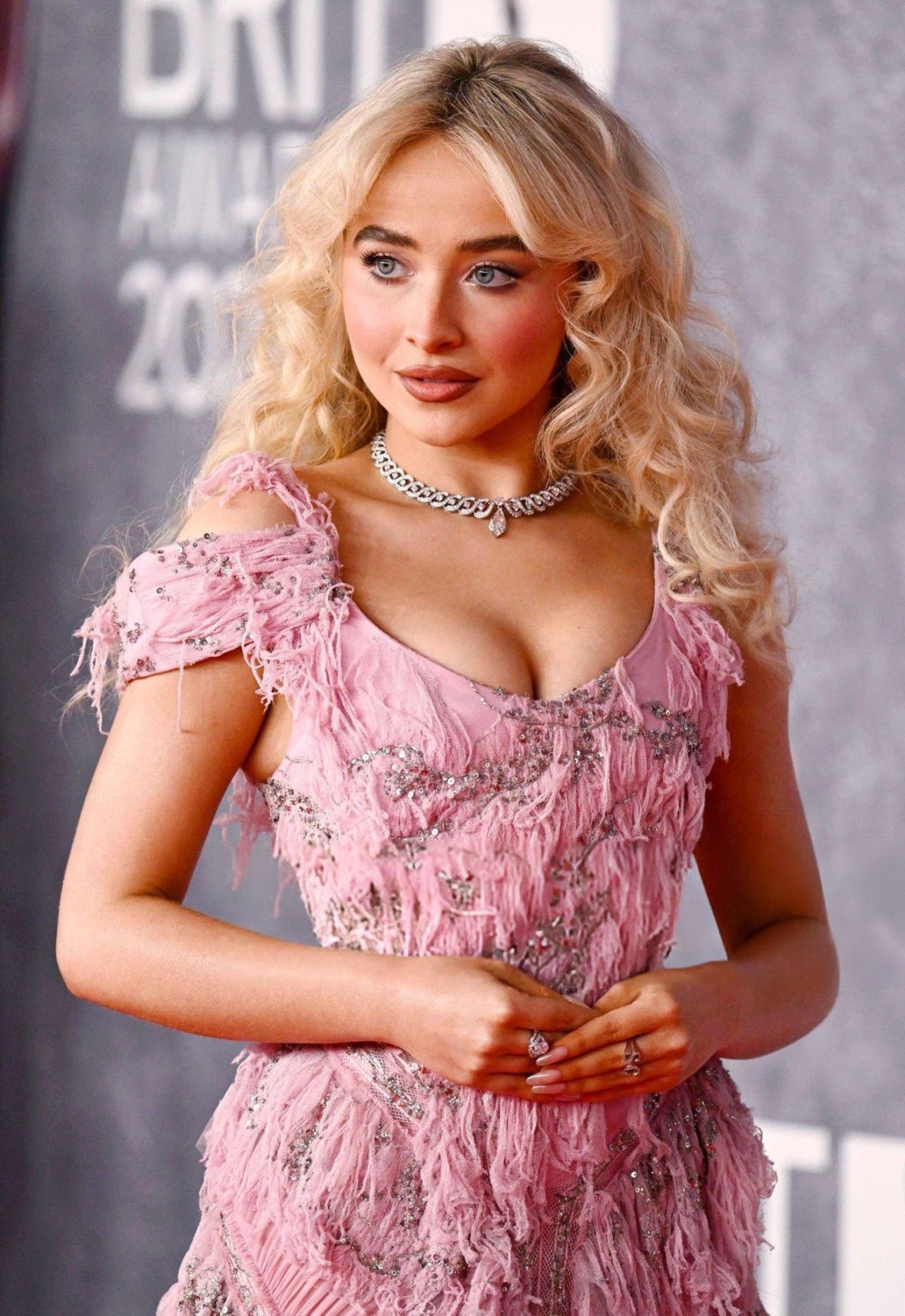 Sabrina Carpenter wearing Coral Pink